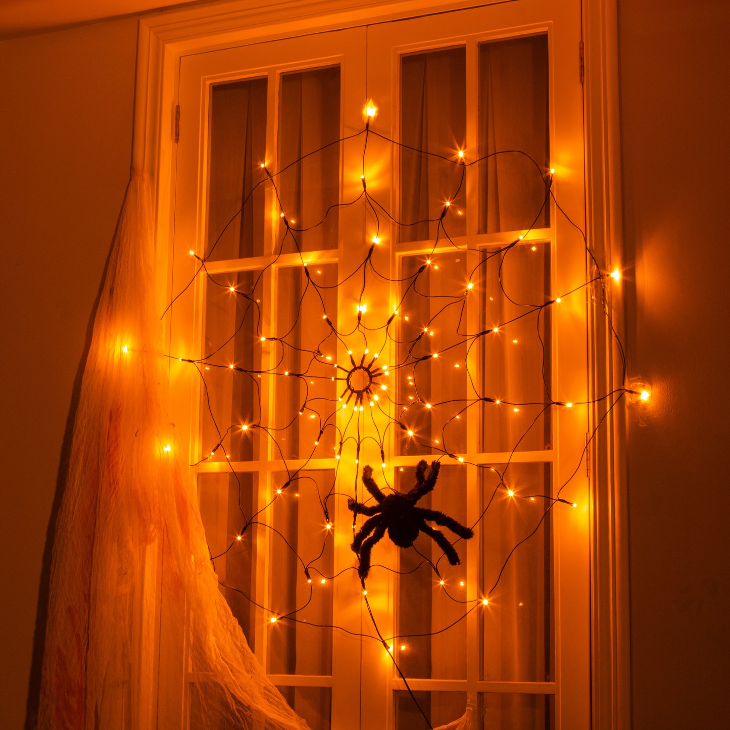 EAMBRITE Halloween Spider Web Lights with 70LED Orange Lights